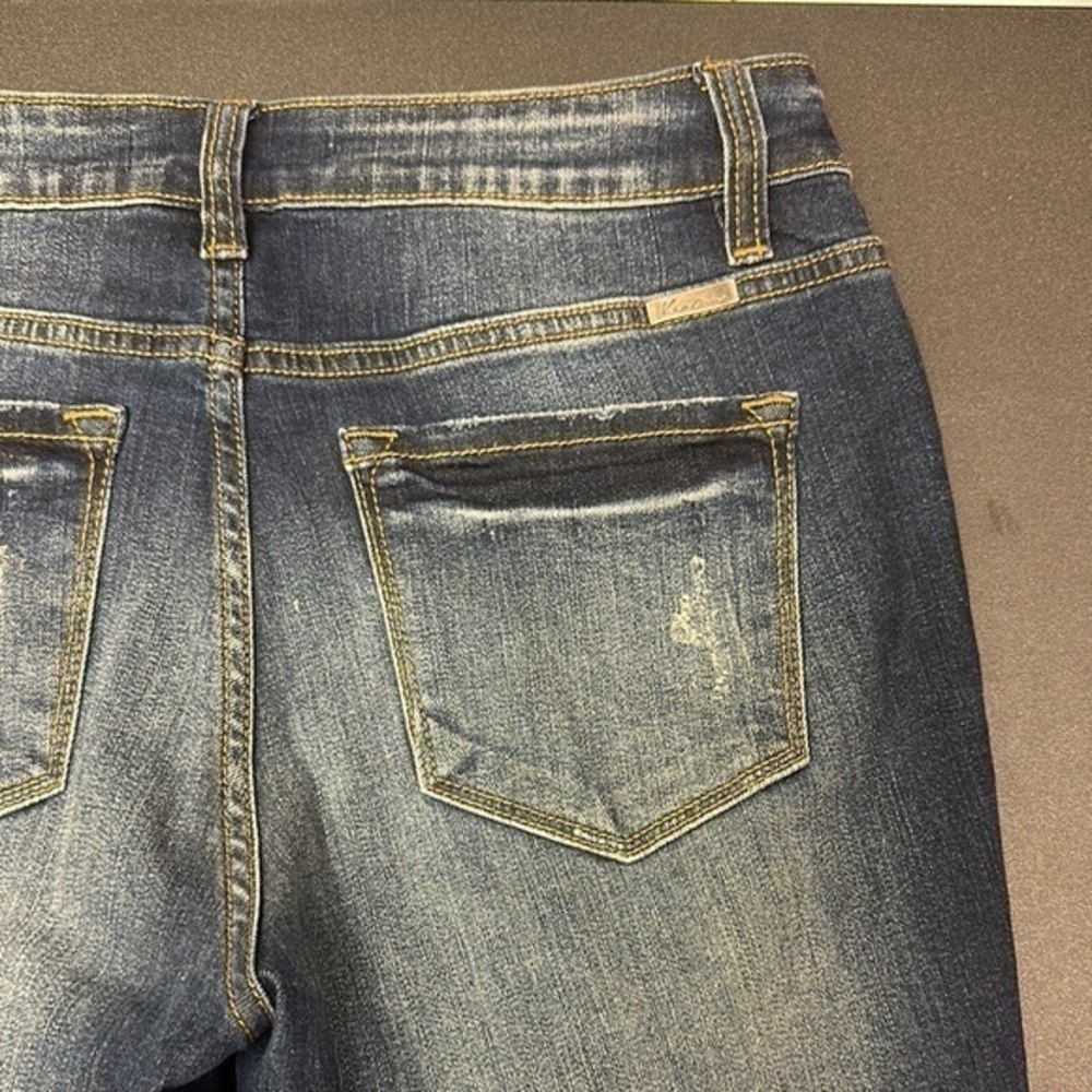 32.   Kancan women’s distressed skinny jean with a cuffed frayed hem size 29